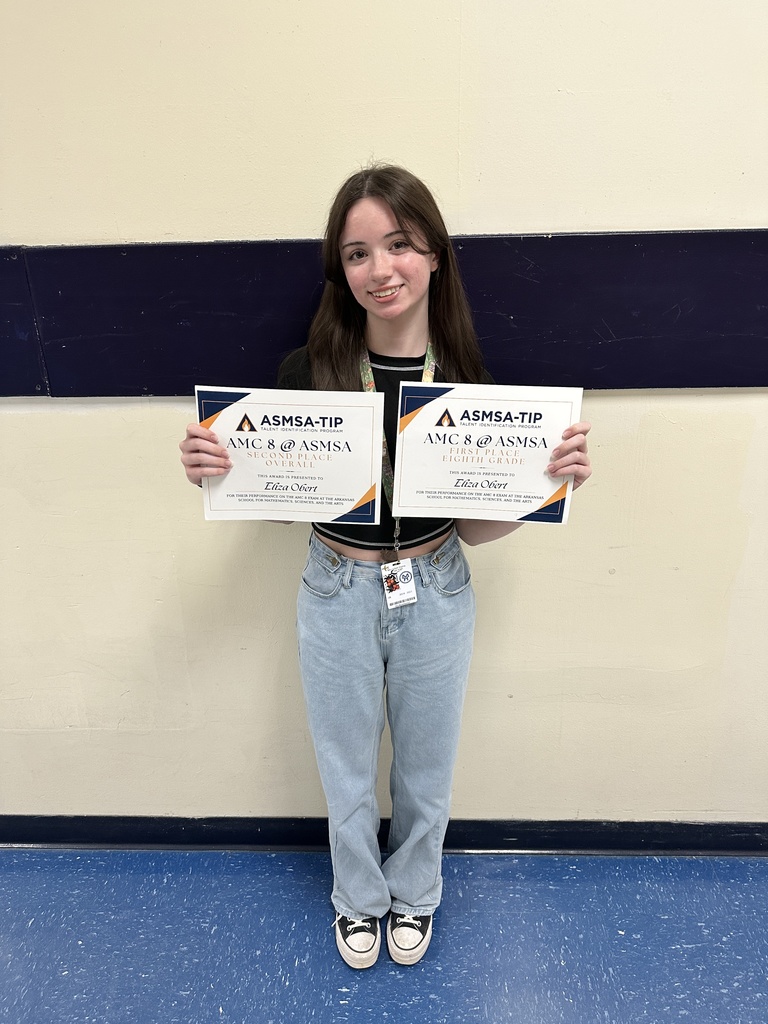 eliza holding two certificates