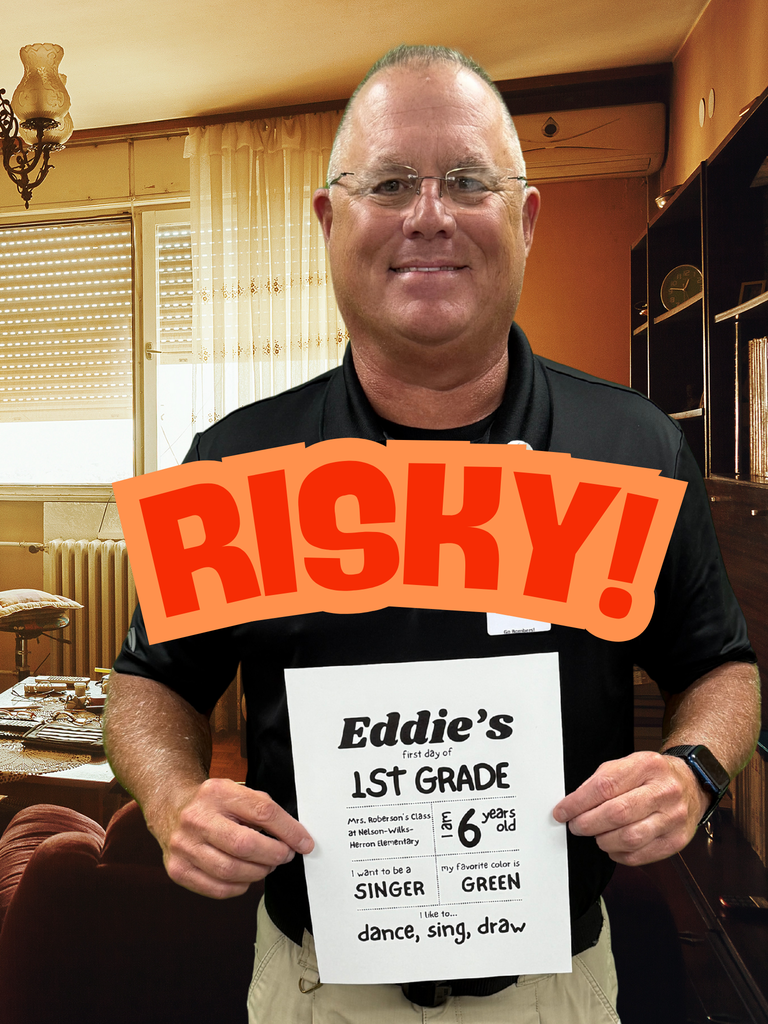Eddie holding a sign that shows too much personal information