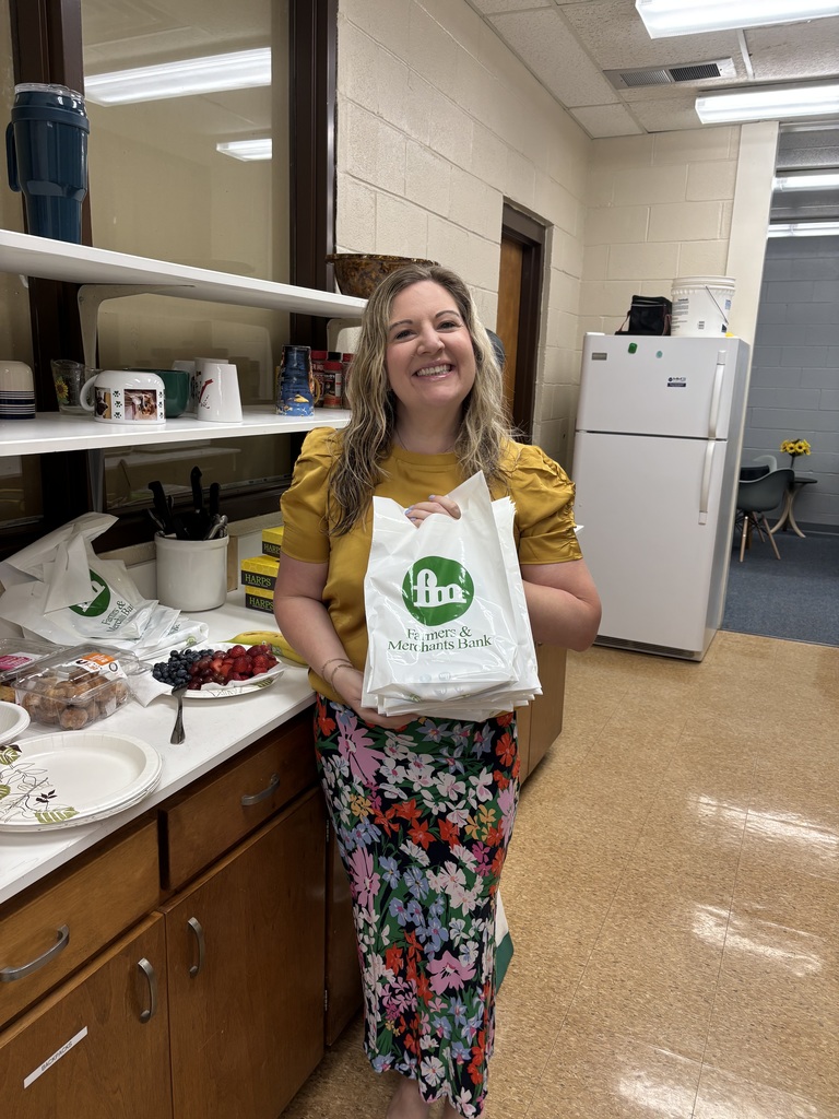 a lady with a gift bag