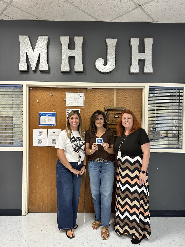 counseling staff holding food card