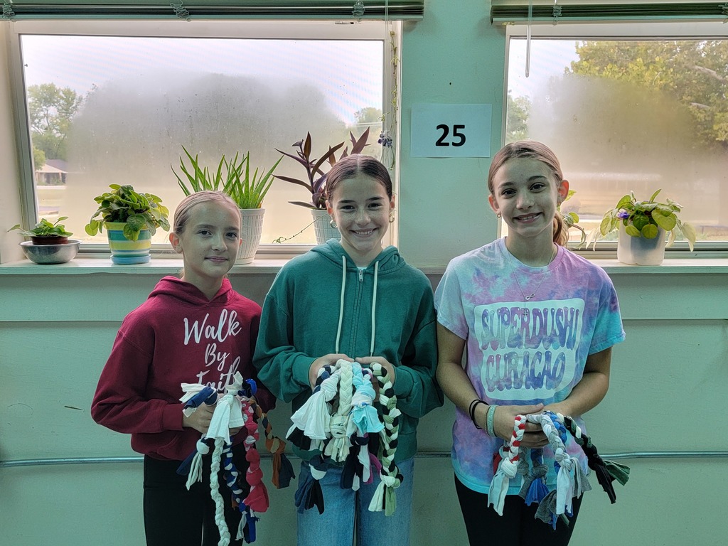 girls with the dog toys they made in middle school
