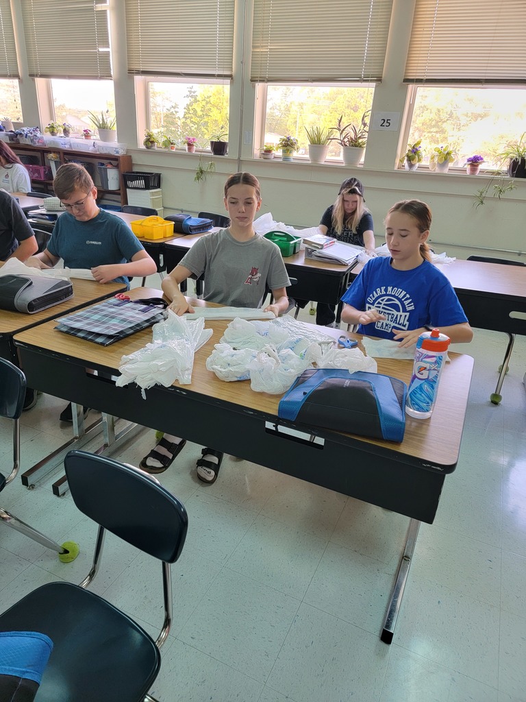 Kids making mats