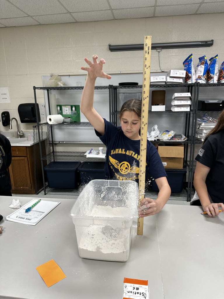 Kid doing crater lab