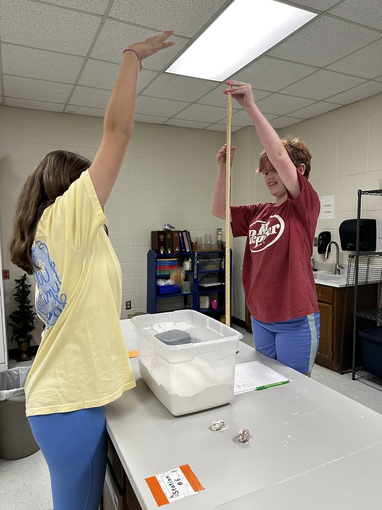 Kid doing crater lab