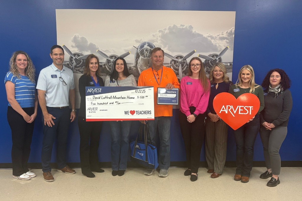 Majors with a group of teachers who won an award