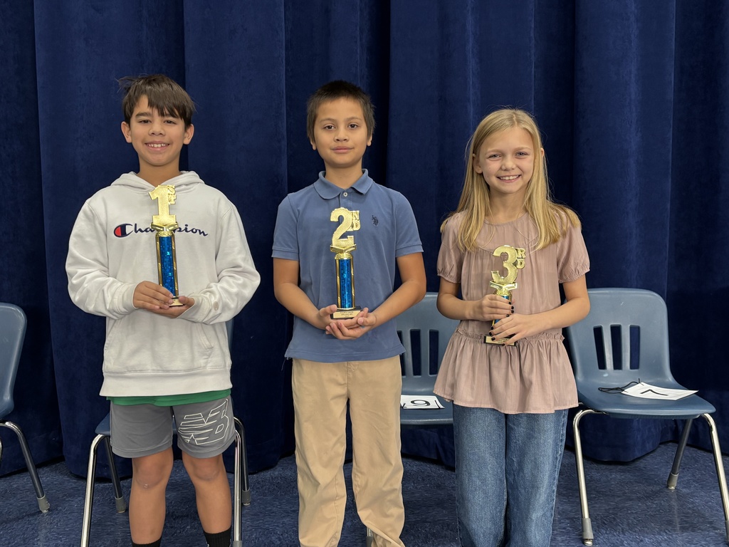 spelling bee winners from 4th grade. Two boys and a girl. 