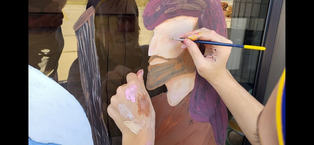 kids painting windows