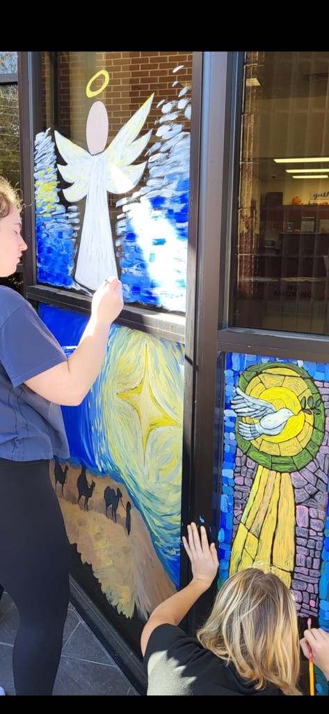 kids painting windows