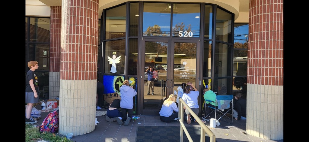 kids painting windows