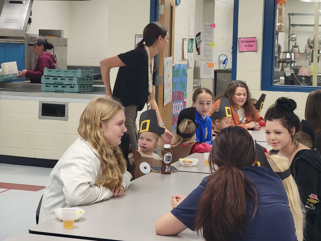 middle school kids with kindergarten students