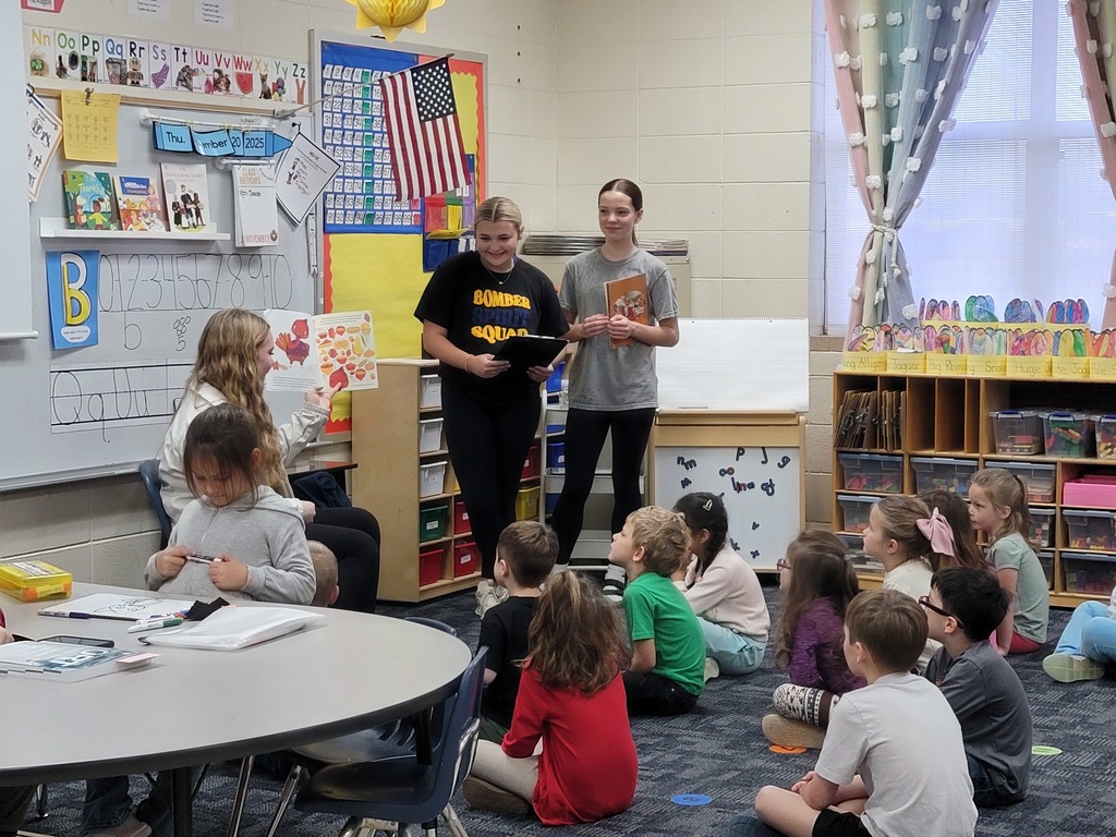 middle school kids with kindergarten students