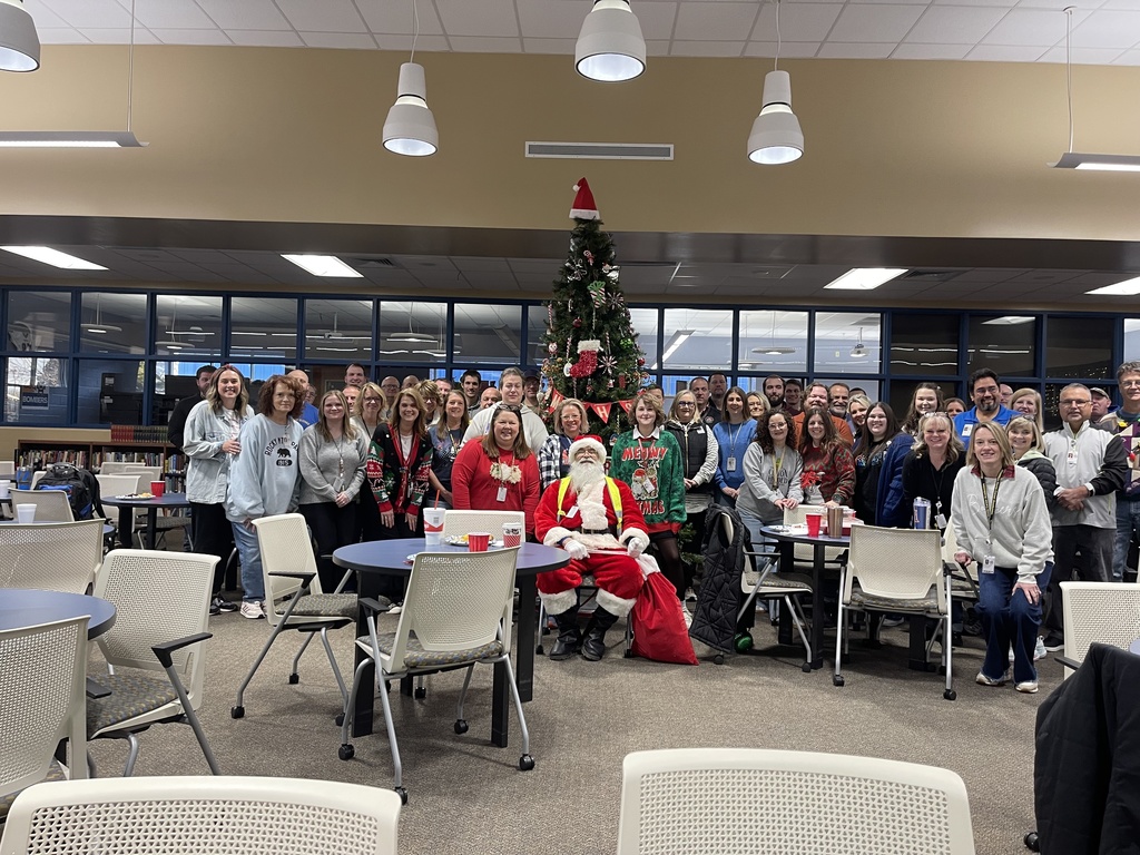 high school staff with santa