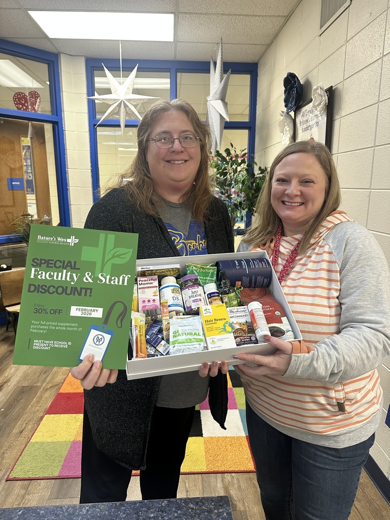 teachers holding goodie basket