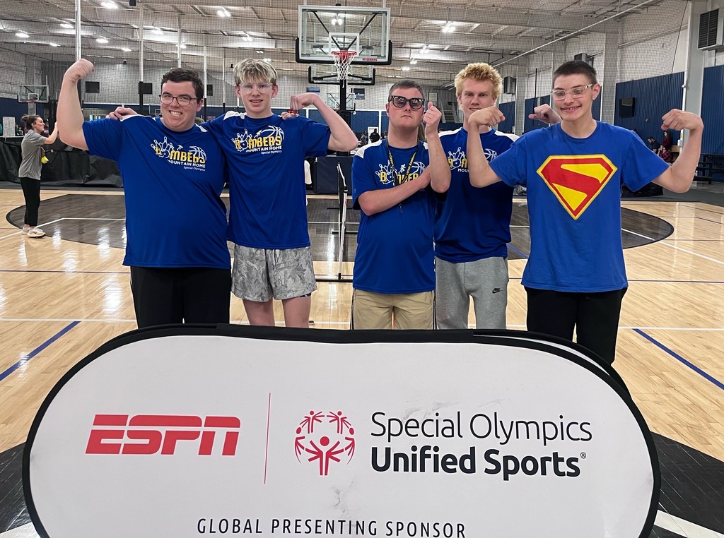kids posing with medals