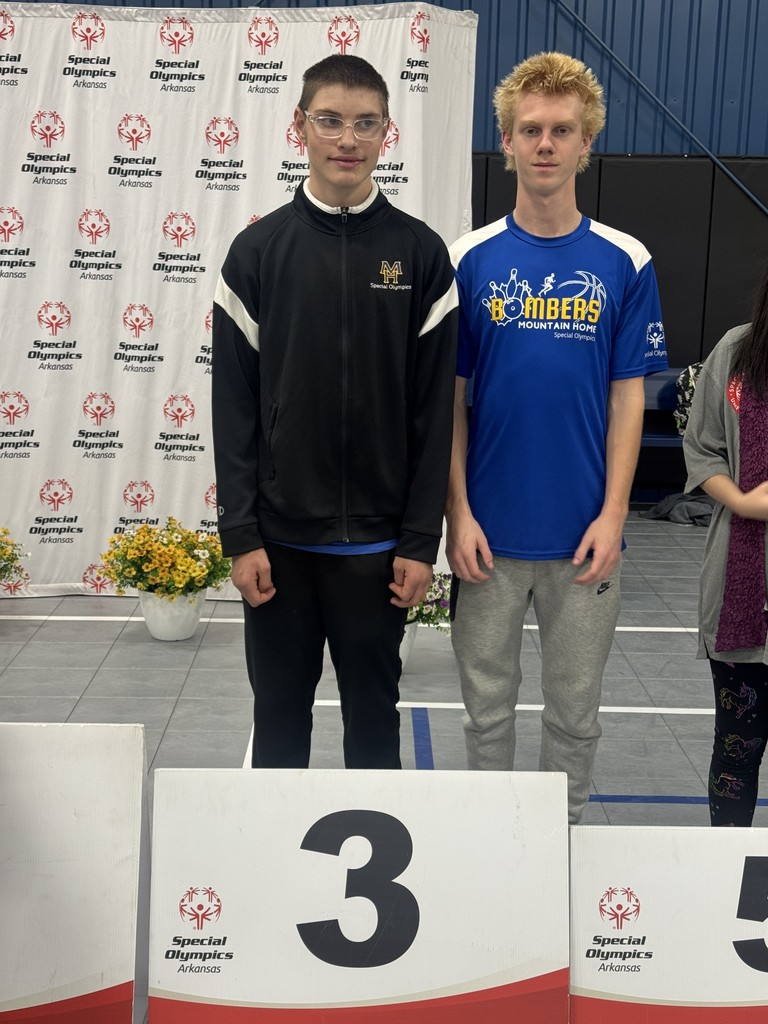 kids posing with medals