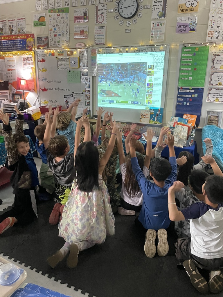 kids cheering for basketball game