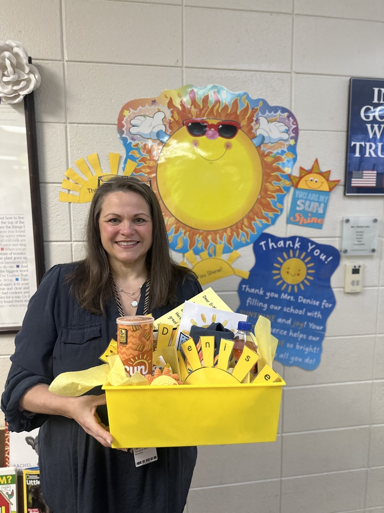 Mrs. Denise (Administrative Assistant at MH Kindergarten) with a basket of goodies. 