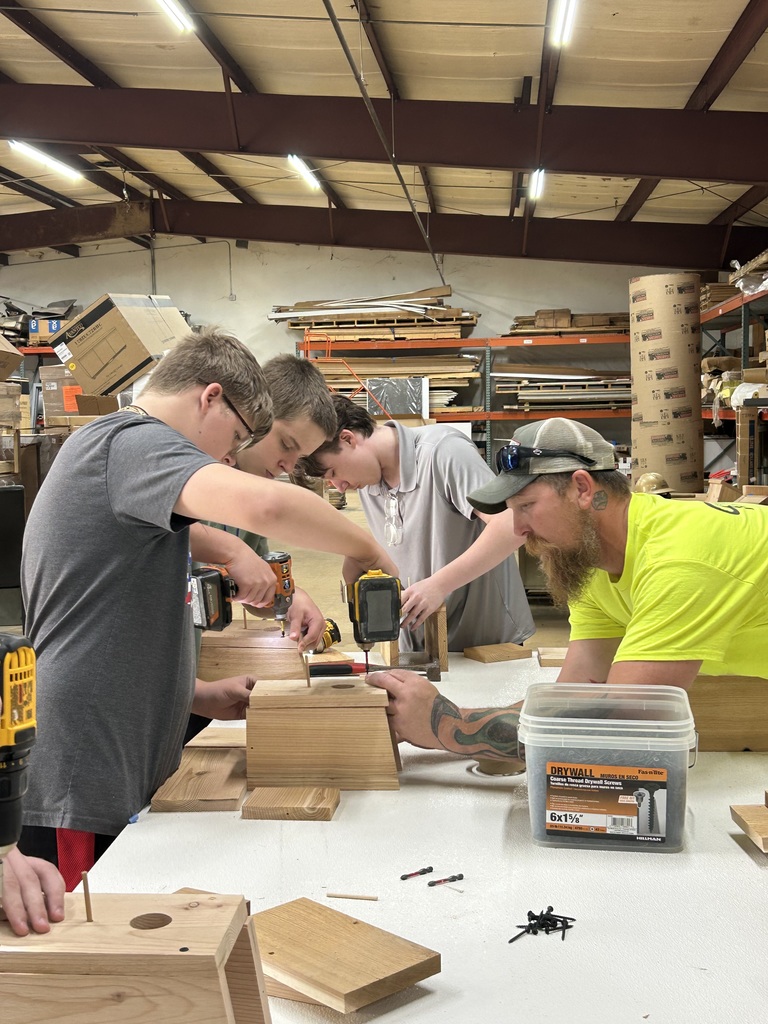 Students working on construction activities 