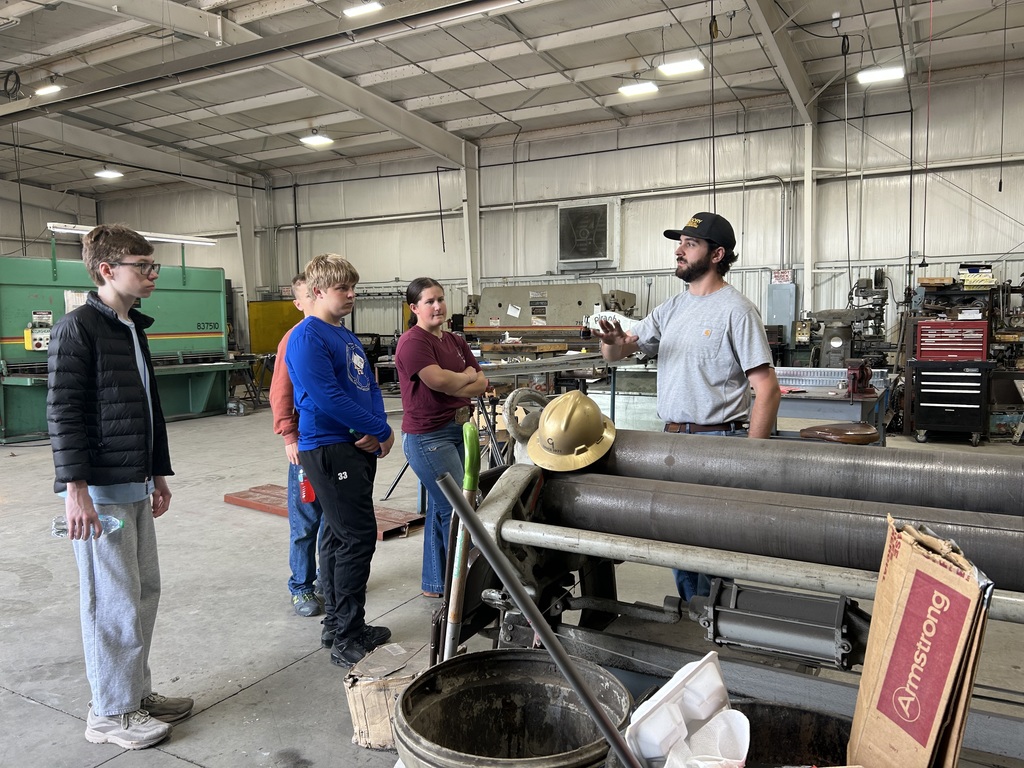 Students learning about construction equipment. 