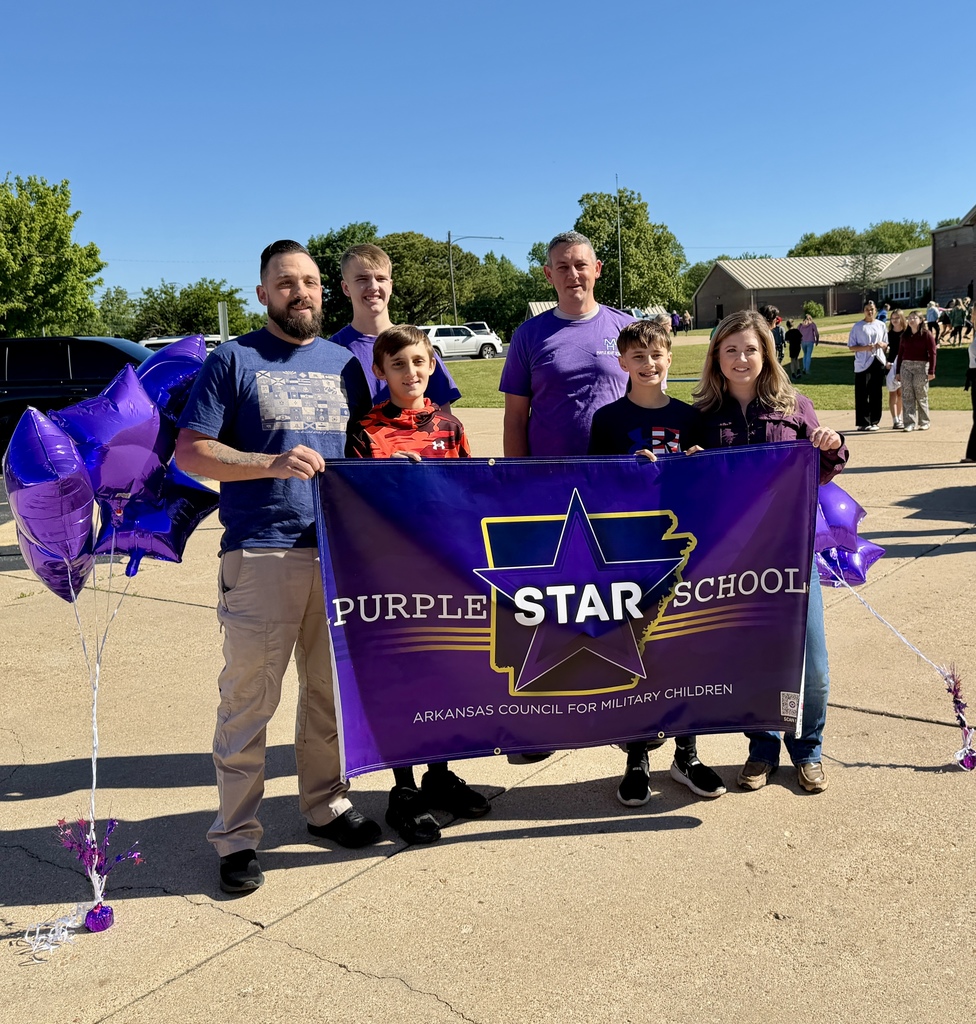 A Mountain Home Public School Military Family at the Pinkston Purple Heart Banner Presentation