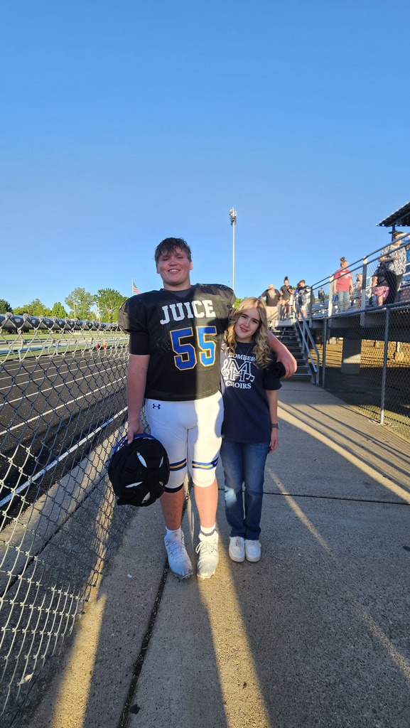Senior, Sylas Moore, with a female student