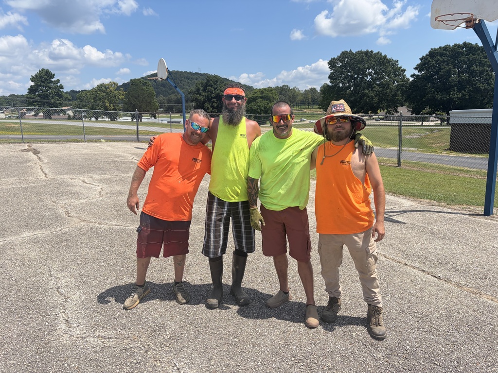 Horton Asphalt Crew working on the Nelson Wilks Herron basketball court
