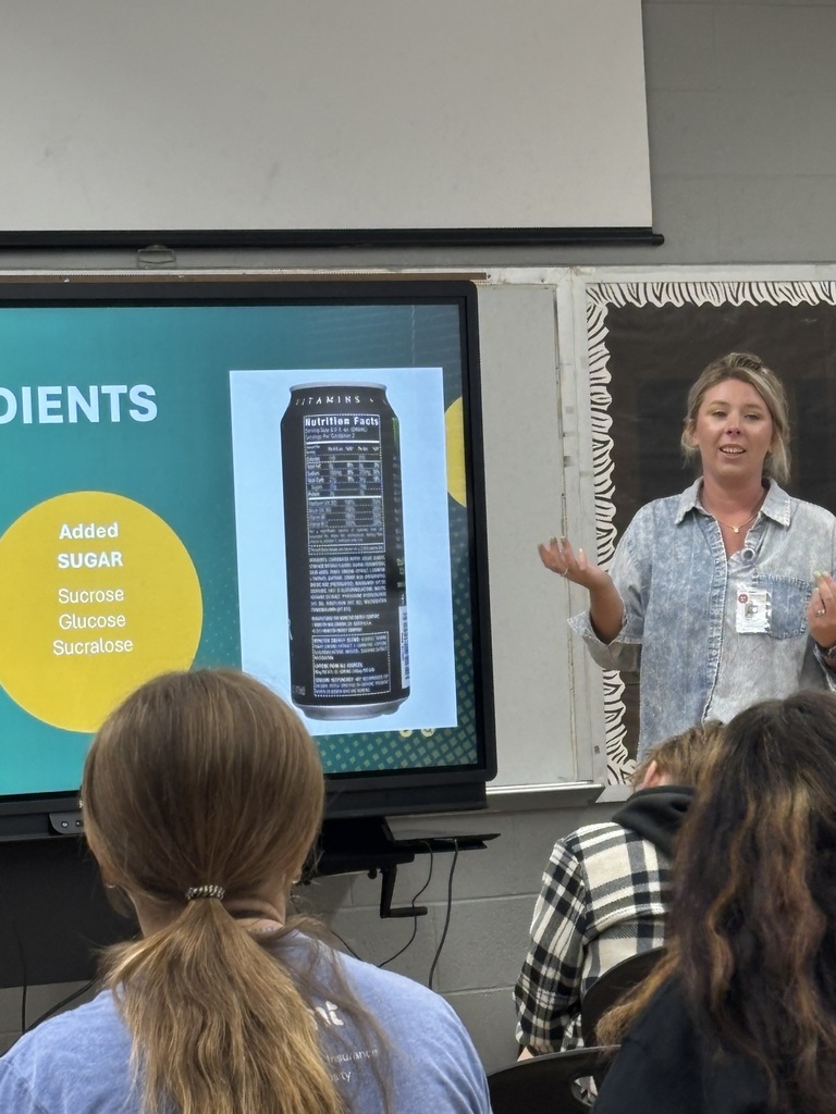 NAESC Co-Op Community Health Promotion Specialist Maicie Kever presents to Guy Berry Students about the dangers of energy drinks