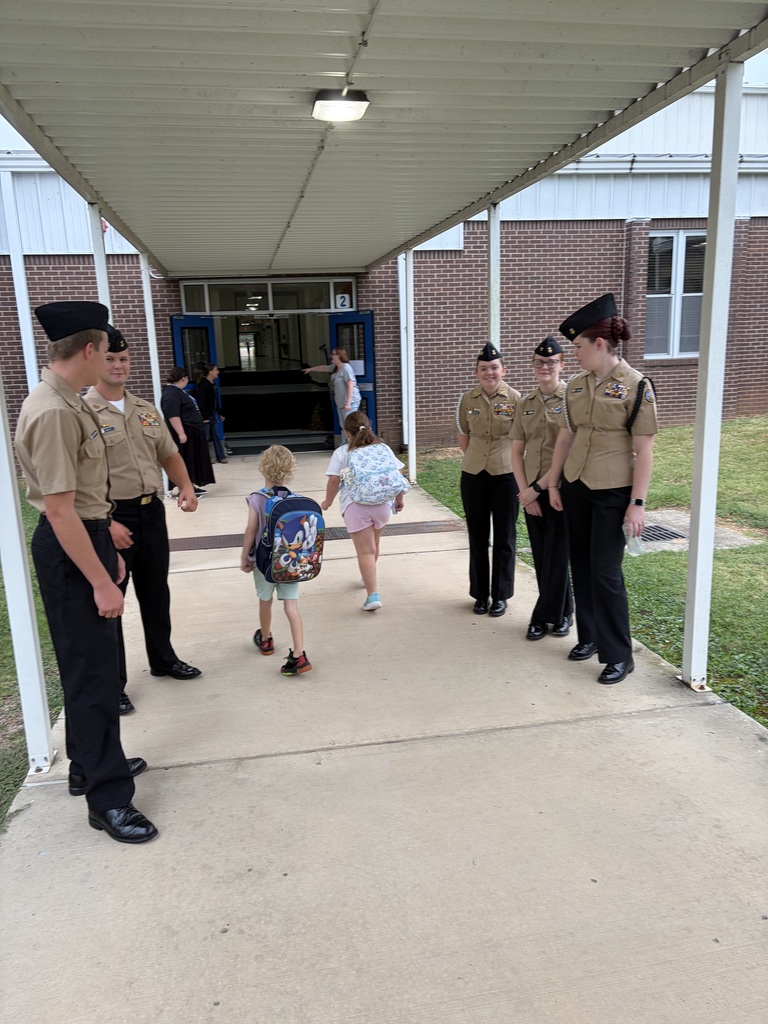 NJROTC Cadets greeting our NWH students at car line this morning. 