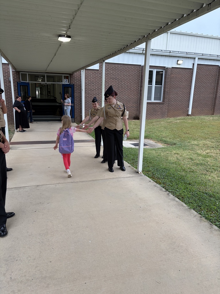 NJROTC Cadets greeting our NWH students at car line this morning. 