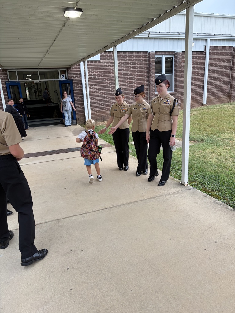 NJROTC Cadets greeting our NWH students at car line this morning. 