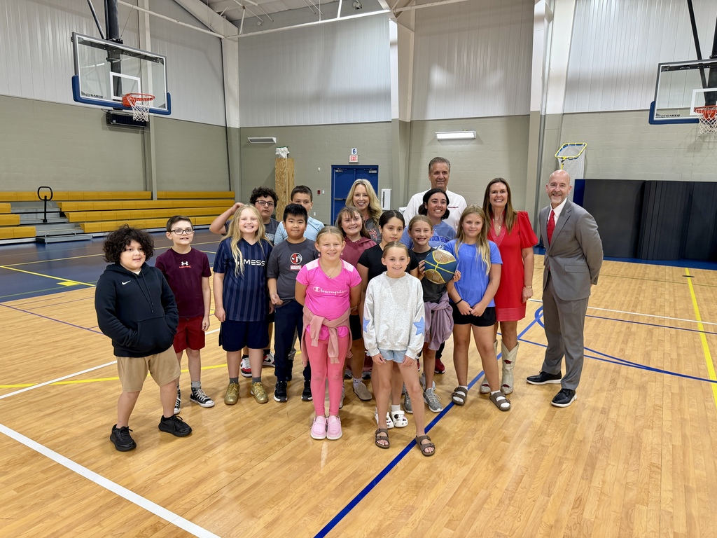 Hackler students who were in the #RazorbackReady2026  video, pictured with Mrs. Resor, their teacher, Governor Sarah Huckabee Sanders, Razorback Coach John Calipari, and ADE Secretary Jacob Oliva