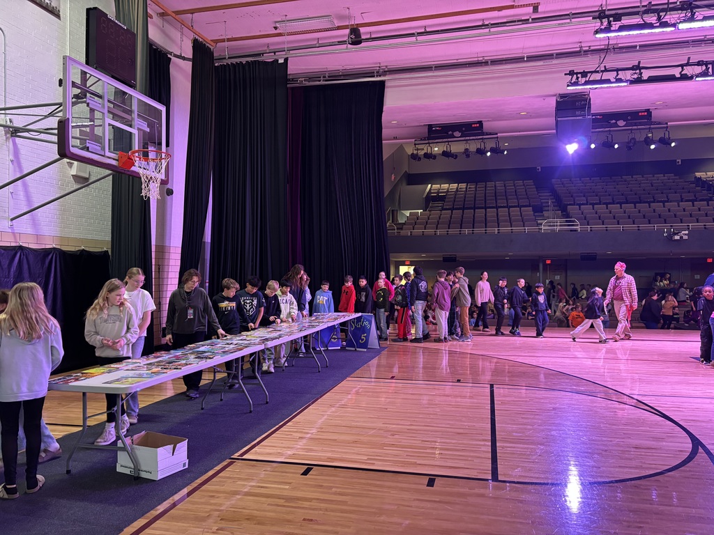 Students picking out books