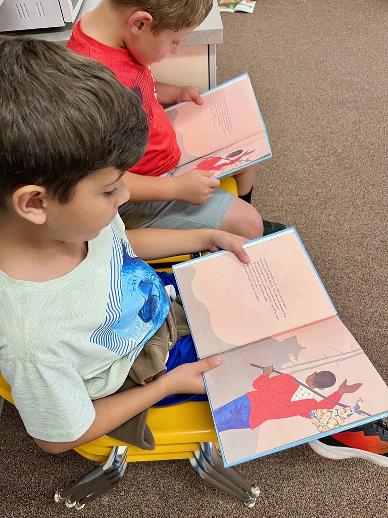 Students reading together.