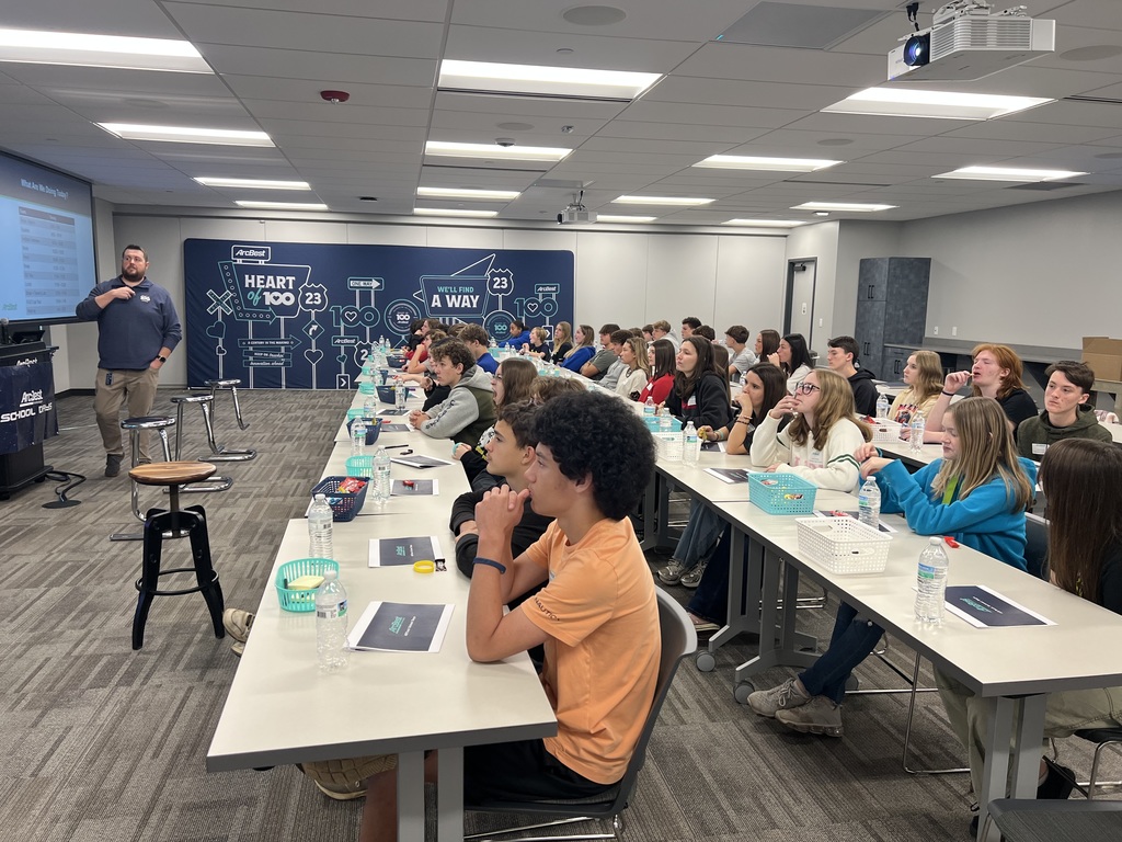 Students seating listening to the speaker from ArcBest