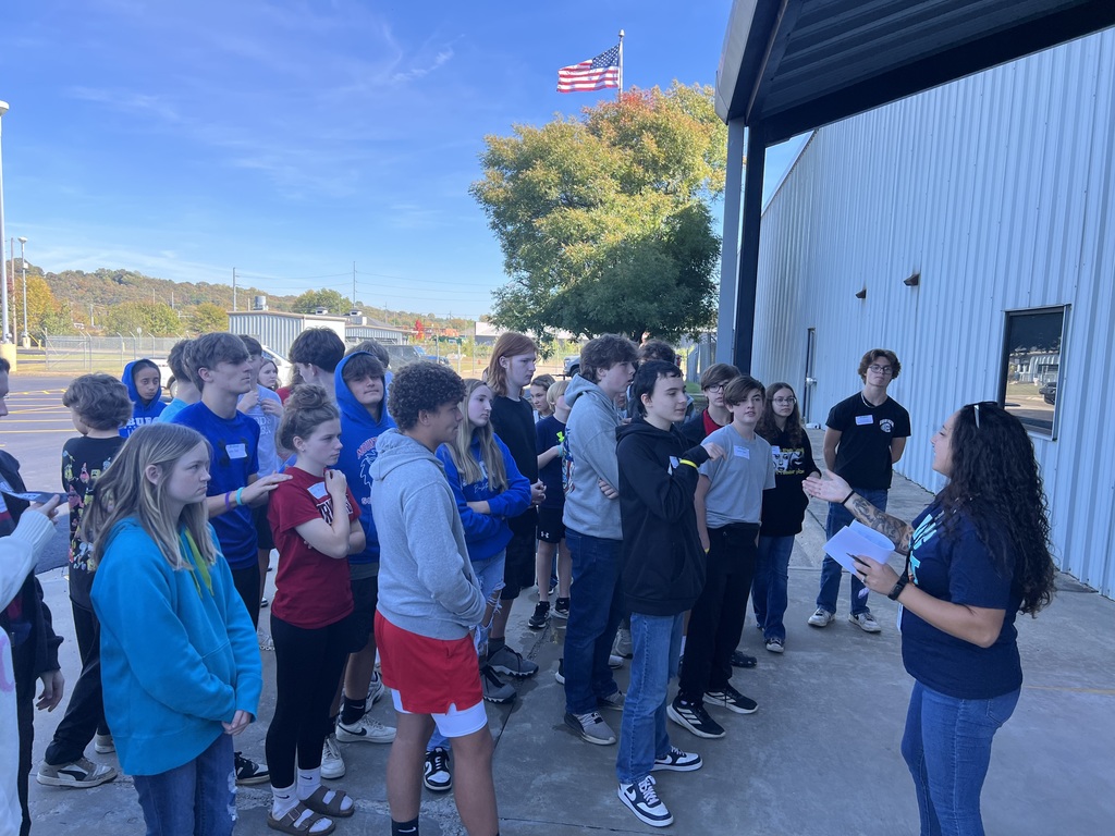Students preparing to enter the Innovations Lab.  Students could not bring in their phone or take pictures because of the sensitive nature of the work that goes on in the R&D lab.