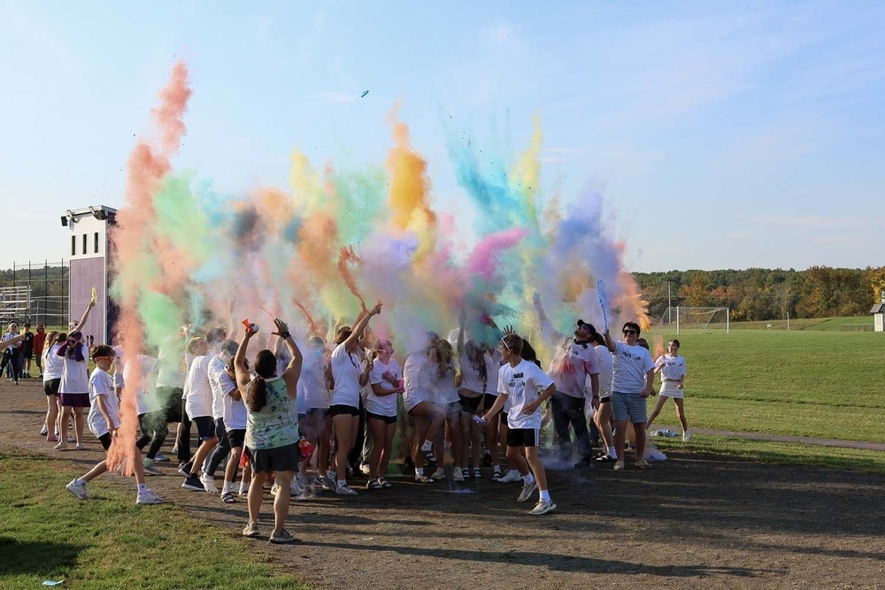 Students at Marshwood Middle School kick off the first color run the school has ever held. This run was a fundraiser to help raise money for field trips through the PTO.