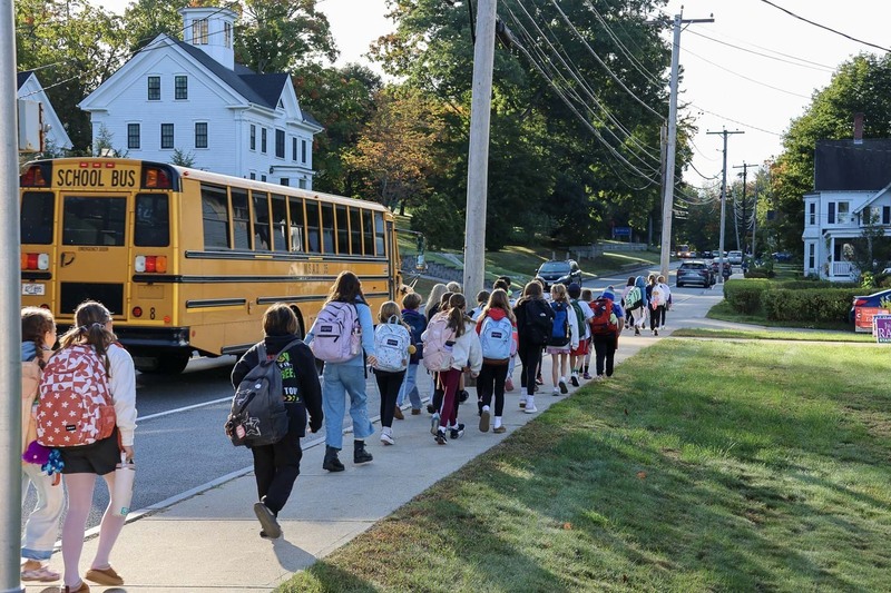 Students from the Jerry Burnell Great Works School walk to school as a part of Walk to School Day