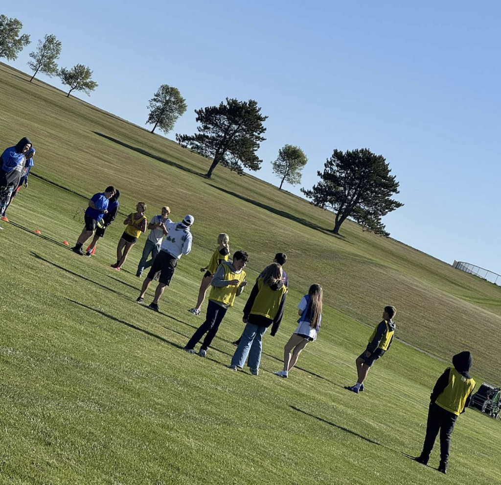 students standing in a field