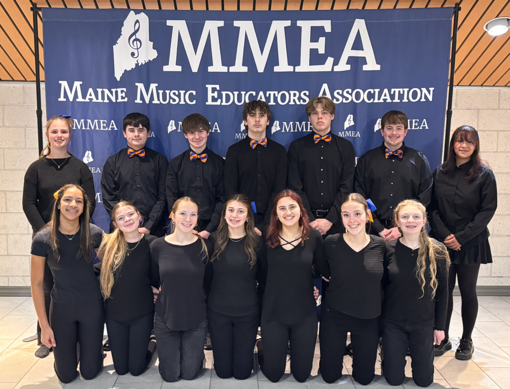 A group of students in black at the MMEA event.