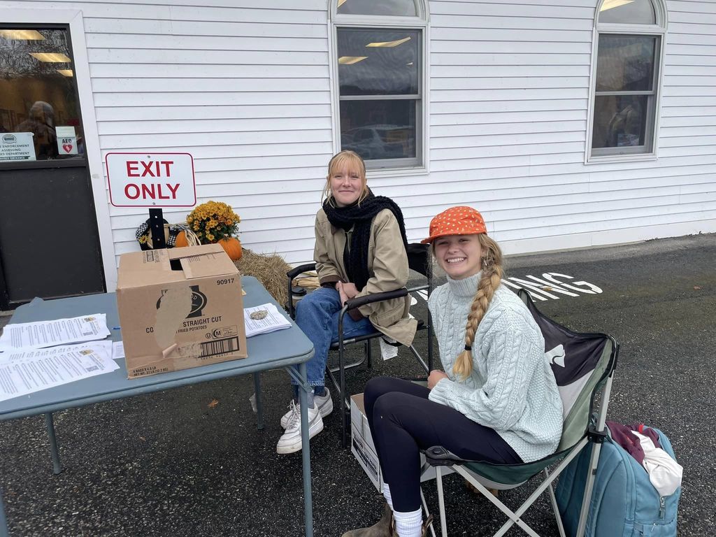 Cedar Worster and Elja Partridge work the polls in Harrison