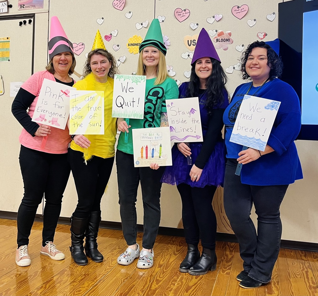 five teachers dressed as crayons