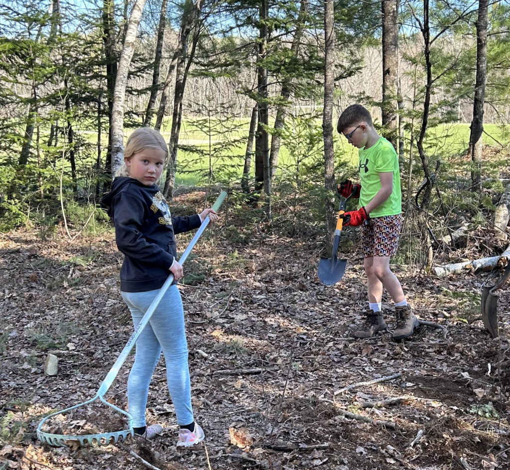 children moving brush