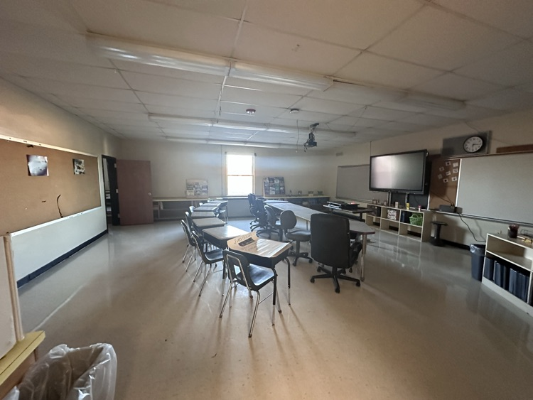 newly set up math class with tables and chairs