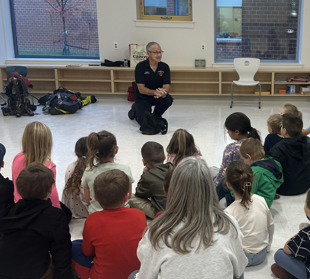 Fire Fighter Rick presenting to Kindergarten Students