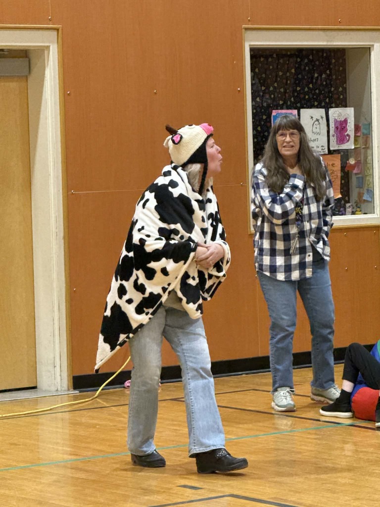 Woman dressed up as a cow.