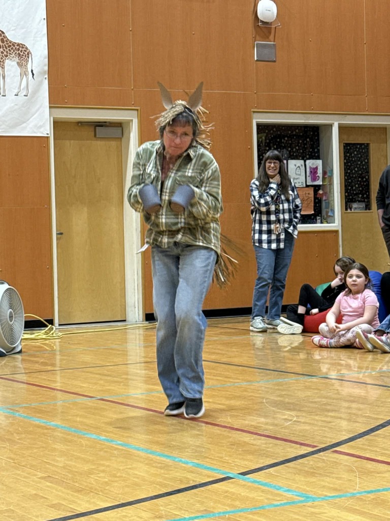 Woman dressed up as a horse. 