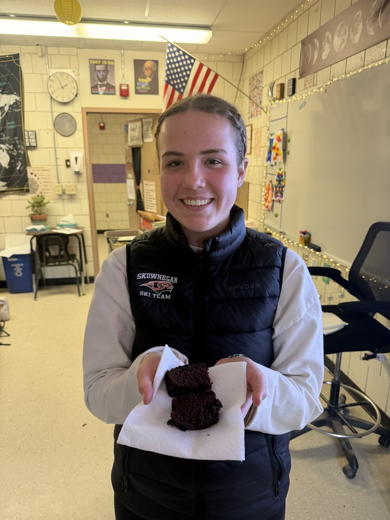 Student with cake.