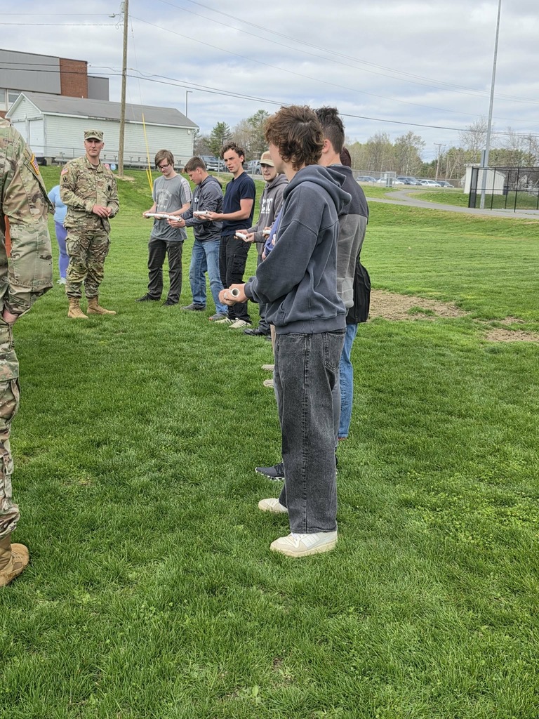 Students working with the challenge course