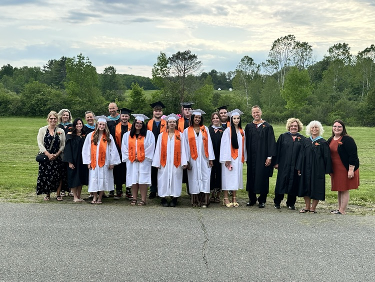 all graduates and staff outside 