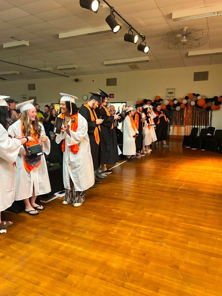 new graduates celebrating 